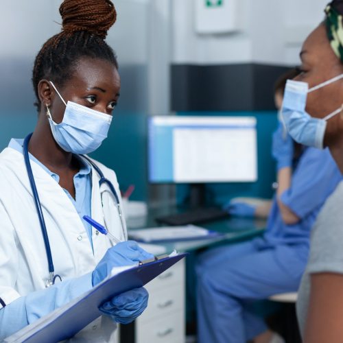 African american therapist doctor wearing protective face mask